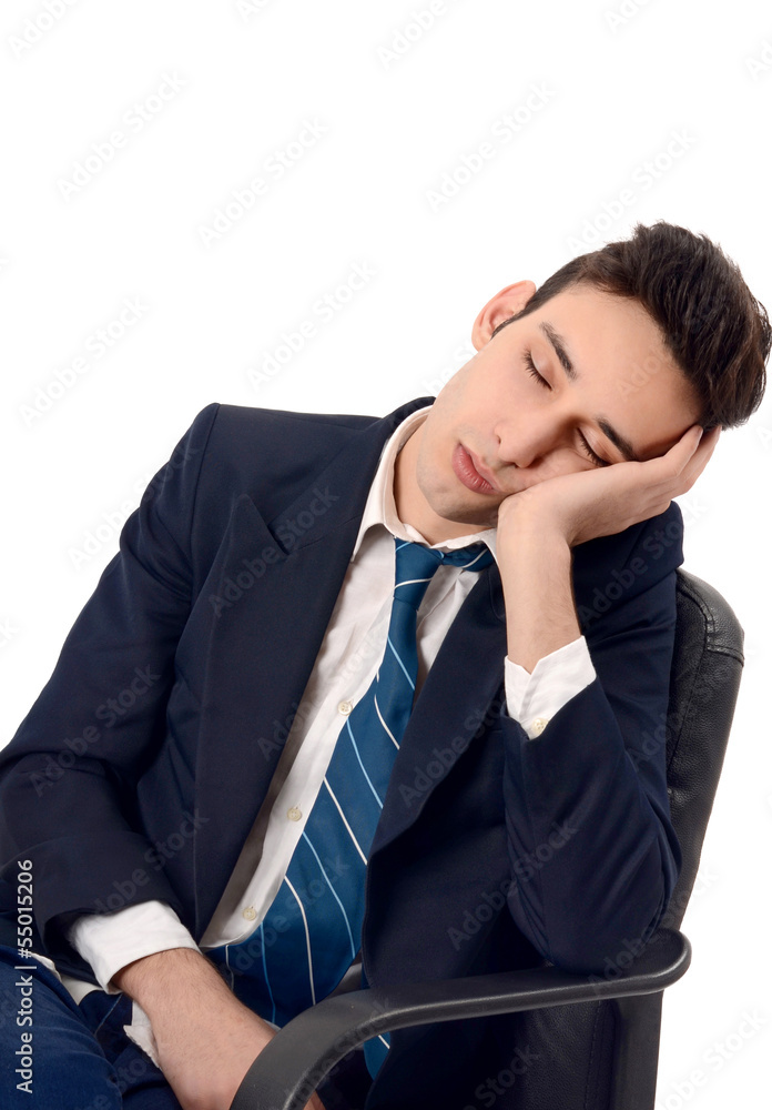Tiered business man sleeping on the job in the chair. Tiered business man sleeping on the job in the chair.