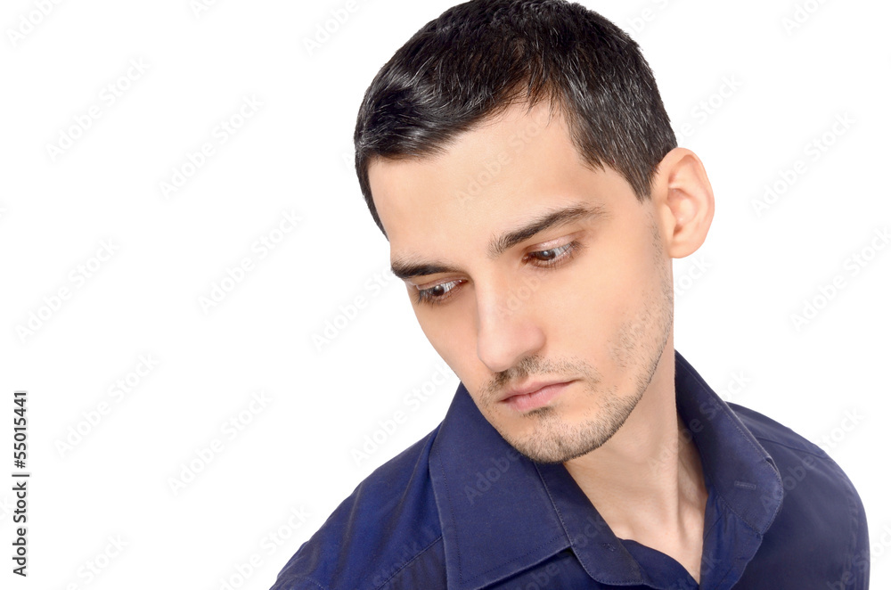 Portrait of a handsome business man looking down. Portrait of a handsome business man looking down.