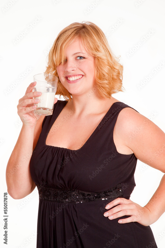 woman in evening dress drink a glass of milk woman in evening dress drink a glass of milk