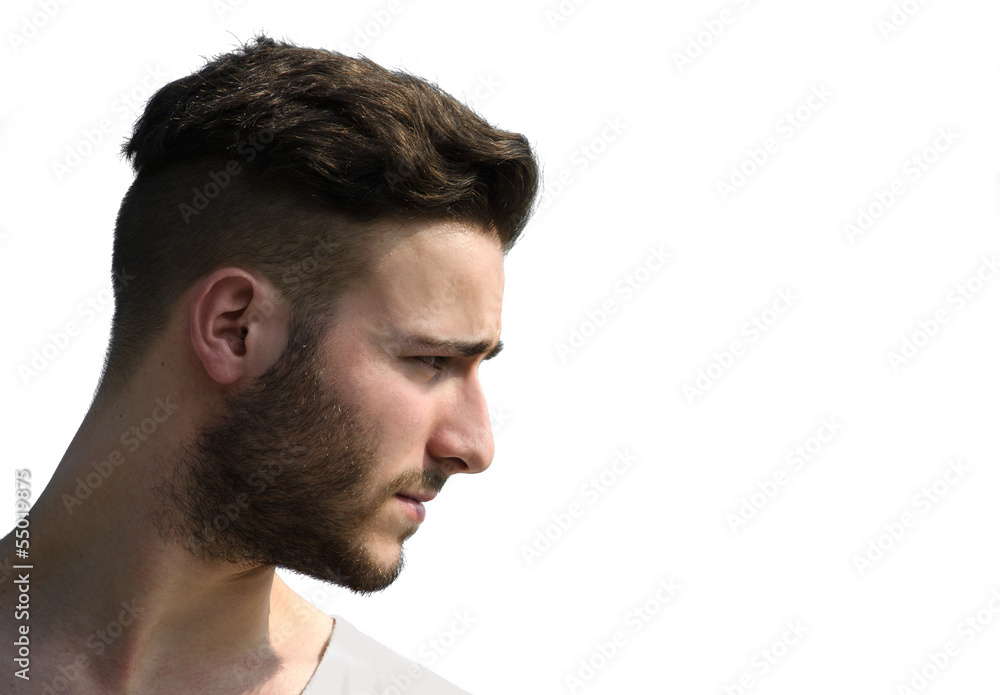 Profile shot of young man's face looking to a side Profile shot of young man's face looking to a side