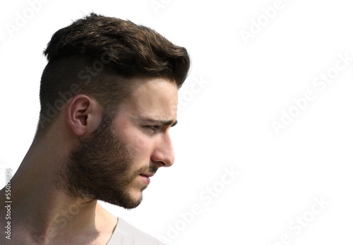 Profile shot of young man's face looking to a side