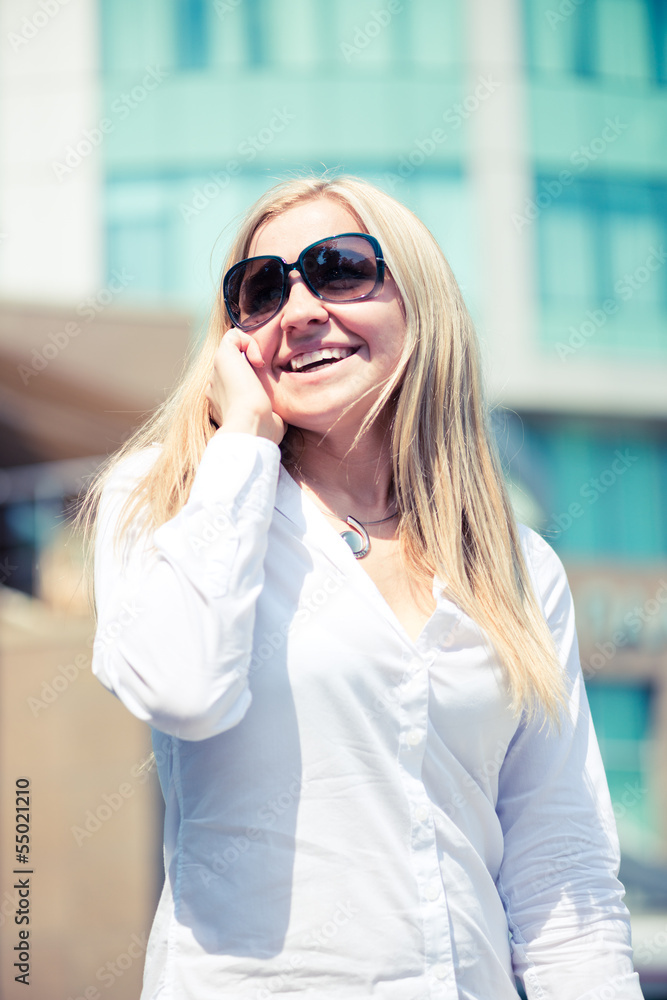 Young businesswoman calling on the phone Young businesswoman calling on the phone