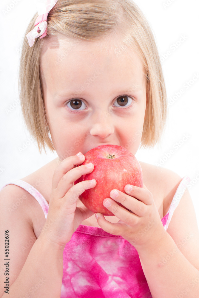 Portrait of happy child eating red apple Portrait of happy child eating red apple