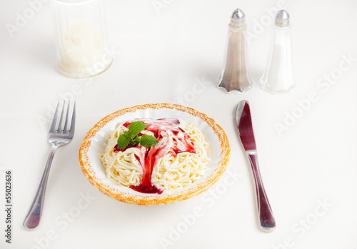 vanilla spaghetti ice cream with dishes sugar and cacao