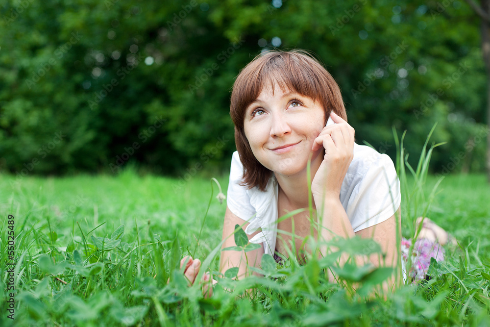 Smiling young woman talking mobile outdoor Smiling young woman talking mobile outdoor