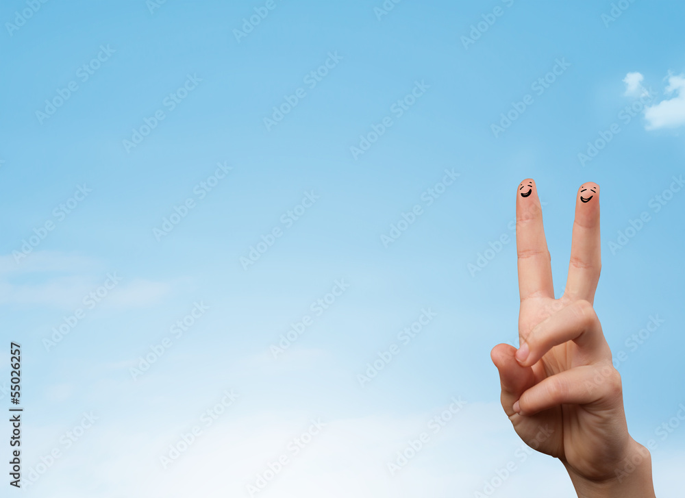 Happy smiley fingers looking at clear blue sky copyspace Happy smiley fingers looking at clear blue sky copyspace