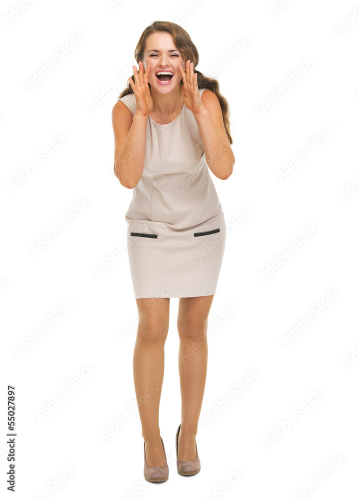 Full length portrait of smiling young woman shouting through meg Full length portrait of smiling young woman shouting through meg