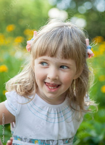 Portrait of charming little girl