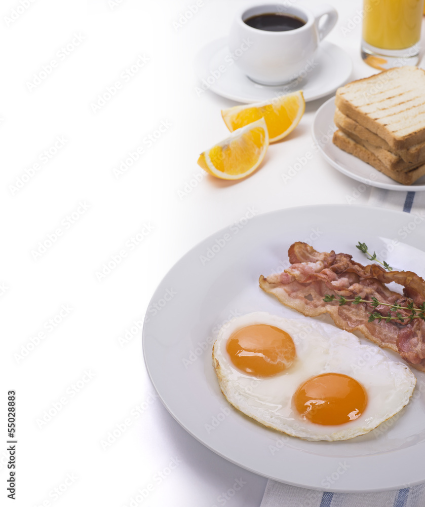 Breakfast with bacon and fried eggs with coffee Breakfast with bacon and fried eggs with coffee