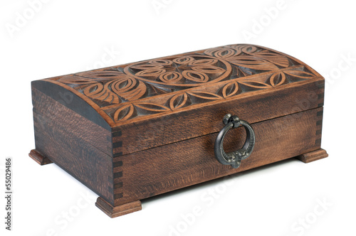 Oriental wooden jewelry box with ornaments on a white background