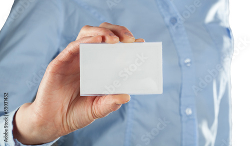 Woman showing blank business card