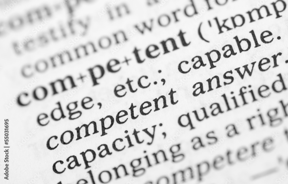 Macro image of dictionary definition of competent Macro image of dictionary definition of competent
