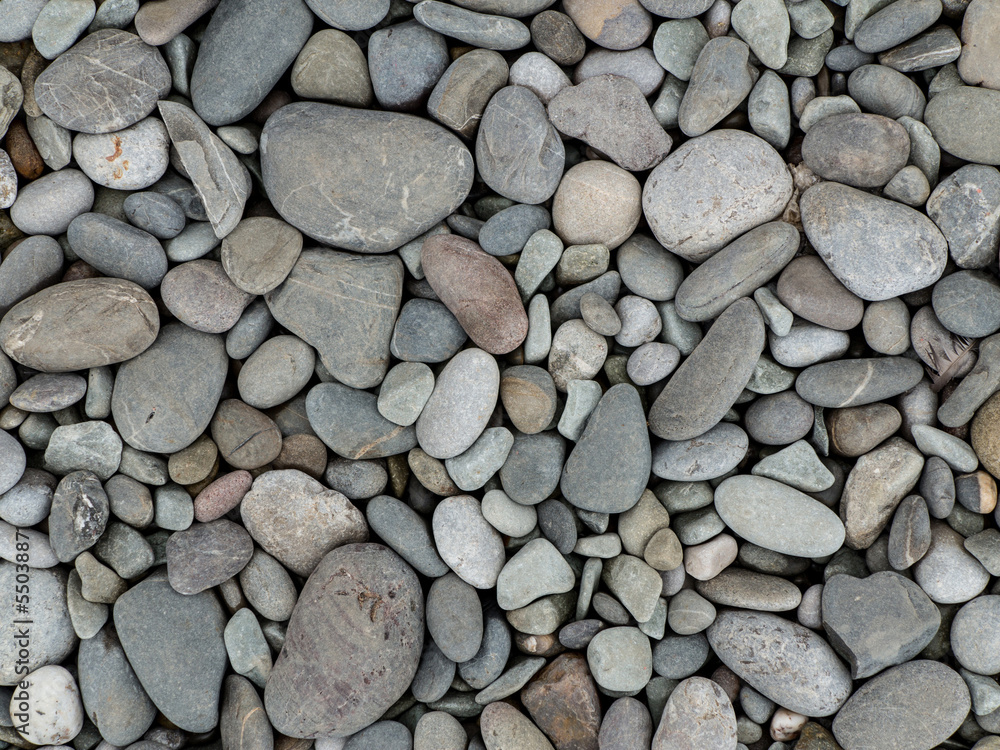 Pebbly seashore background - close-up shot Pebbly seashore background - close-up shot