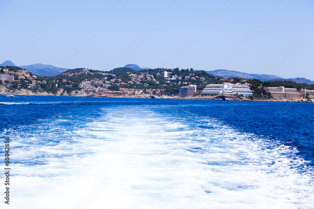 The waves from a high-speed boat. waterway. Sea Travel