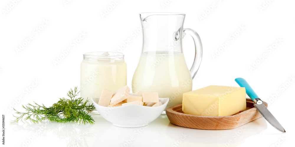 Fresh dairy products with greens isolated on white