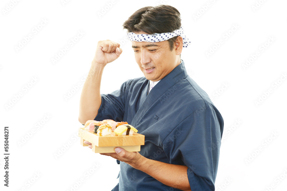 ガッツポーズの寿司職人