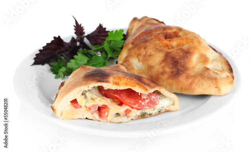 Fotografi Pizza calzone on table isolated on white