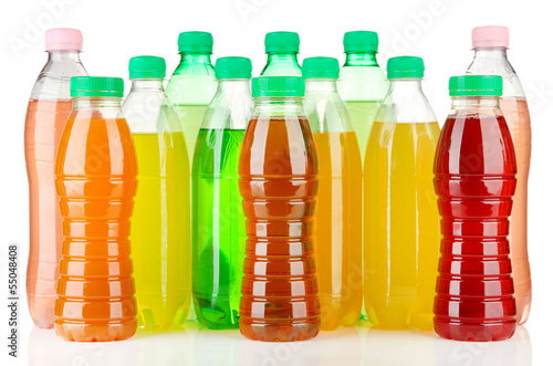 Assortment of bottles with tasty drinks, isolated on white