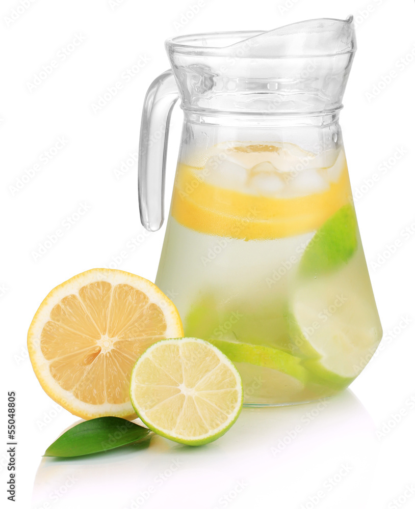 Cold water with lime, lemon and ice in pitcher isolated on Cold water with lime, lemon and ice in pitcher isolated on