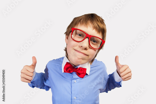 School boy in red glasses