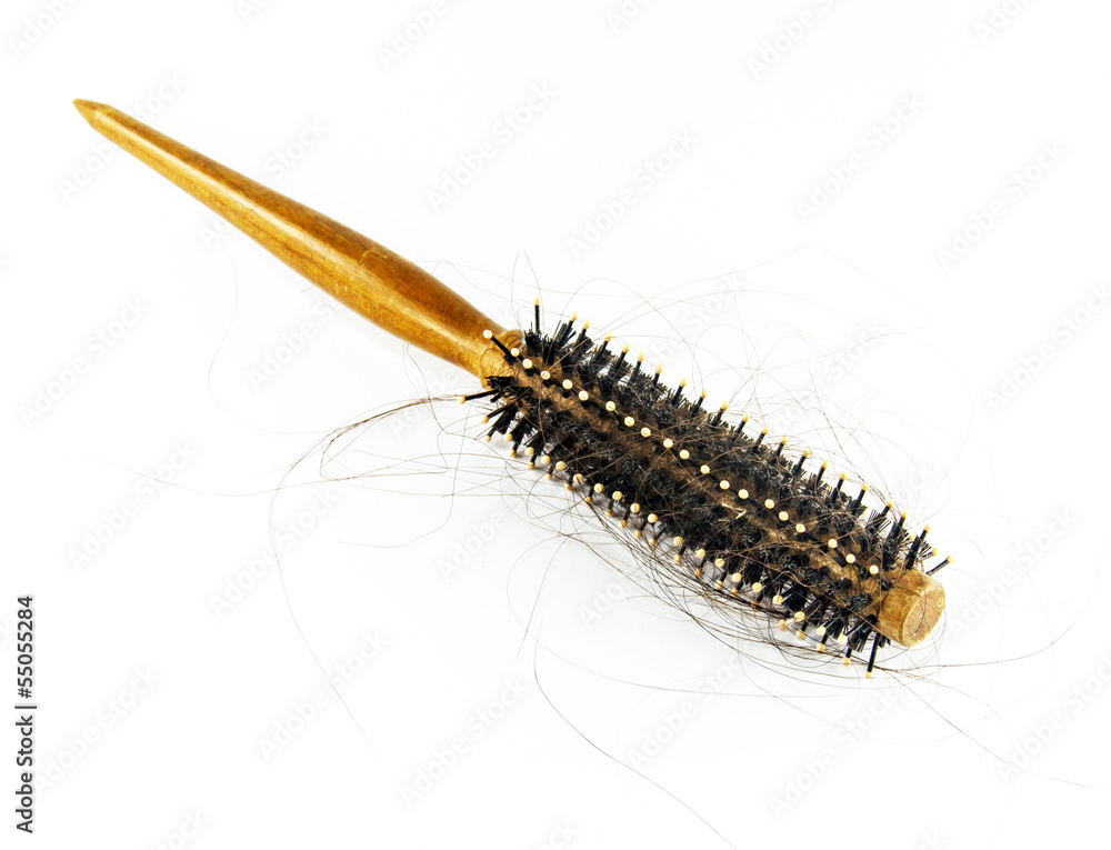 Fototapeta premium round hair brush with lost hair, isolated on white