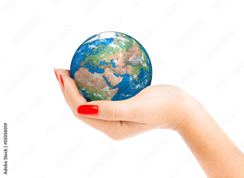 Hand of the person holds globe. Hand of the person holds globe.