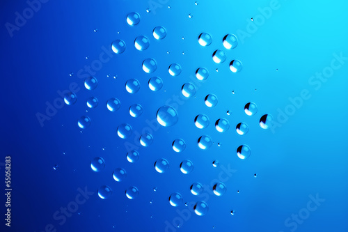 Water Drops in Snowflake shape / Christmas and Winter backgroun