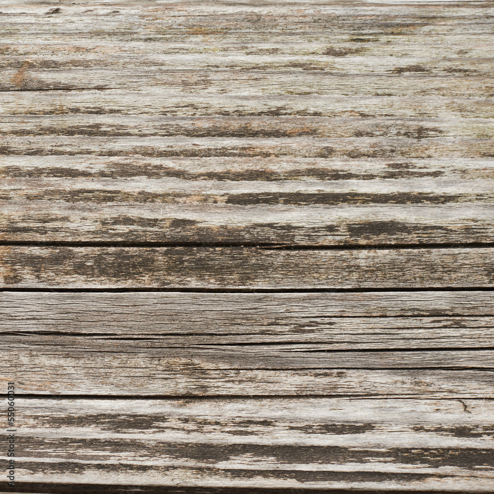 Naklejka premium Cracked and shabby wooden surface