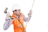 adult man wearing safety equipment descending a rope