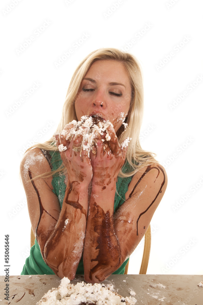 Woman messy in chocolate and whipped cream Stock Photo
