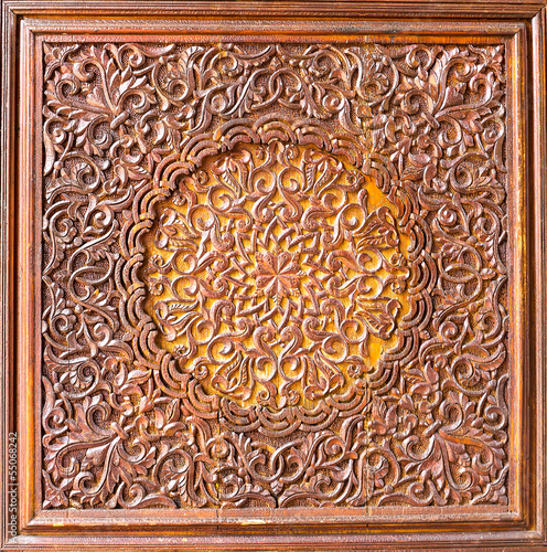 Wood carving of flower motif pattern