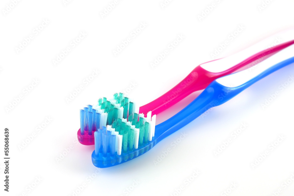 Two tooth-brushes Two tooth-brushes