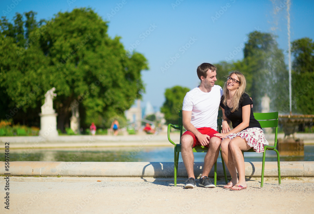 Couple of tourists in the Tuileries garden