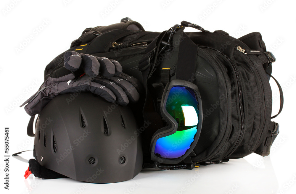 Winter sport glasses, helmet and gloves, backpack, isolated