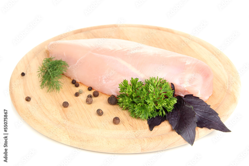 Raw chicken fillets on wooden board, isolated on white Raw chicken fillets on wooden board, isolated on white