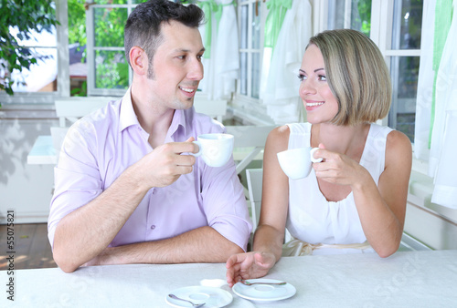 Beautiful couple having romantic dinner at restaurant