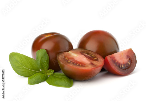 Tomato kumato and basil leaf