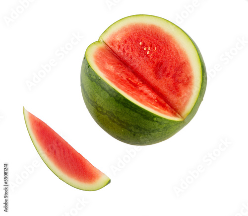 Closeup of watermelon (whole and slice) on white background