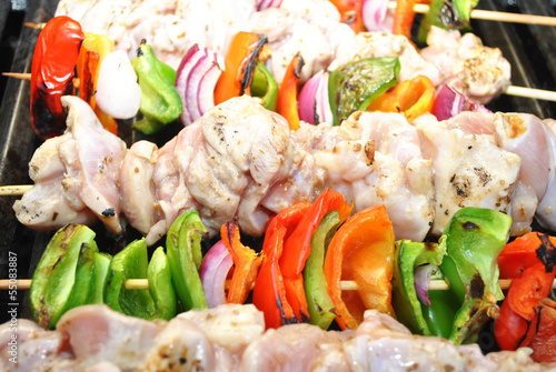 Raw Chicken and Pepper Kabobs on a Hot Grill