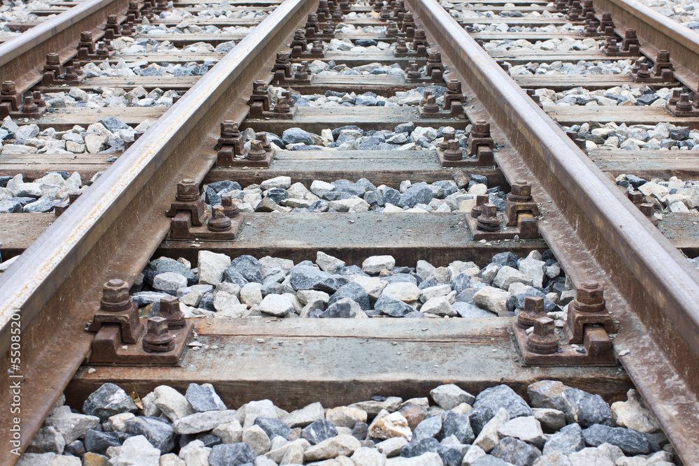 Obraz premium Newly laid train tracks on timber ballasts