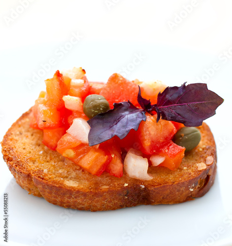 Obraz na płótnie Bruschetta with tomatoes and basil w salonie