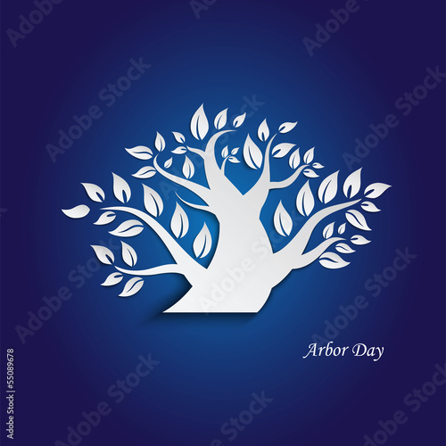 Silhouette of a tree with leaves on blue backgroundtrees photo