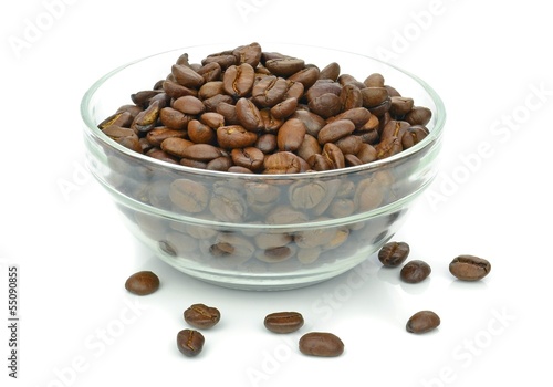Fototapeta Naklejka Na Ścianę i Meble -  A glass bowl of coffee beans on a white background