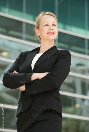 Happy businesswoman smiling outdoors