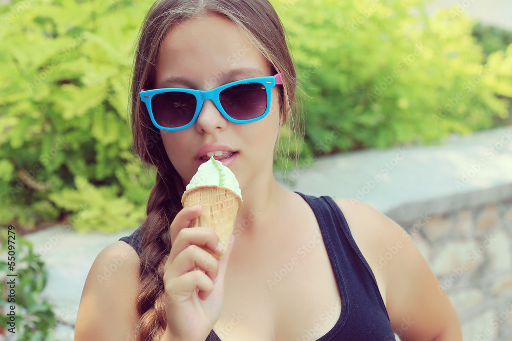 chubby girl eating pistachio ice cream chubby girl eating pistachio ice cream