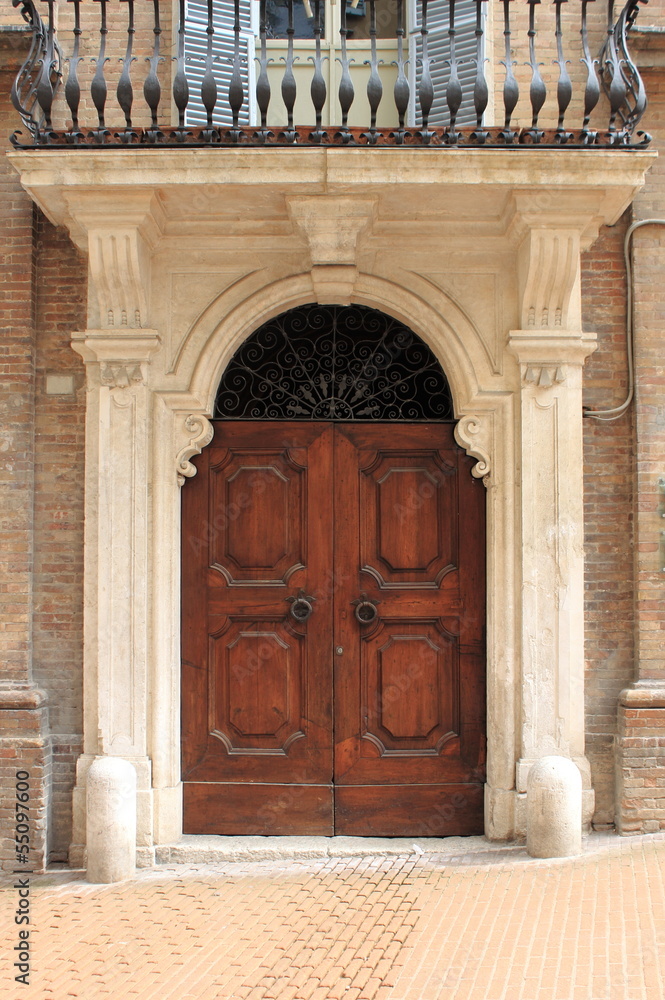 Renaissance front door in Urbino, Italy