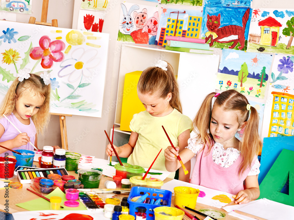 Naklejka premium Children painting at school.