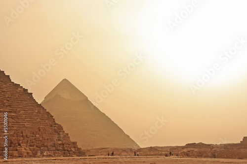 Great Pyramids of Giza in a sand strom, Cairo photo