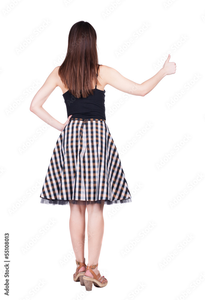 Back view of  woman thumbs up.