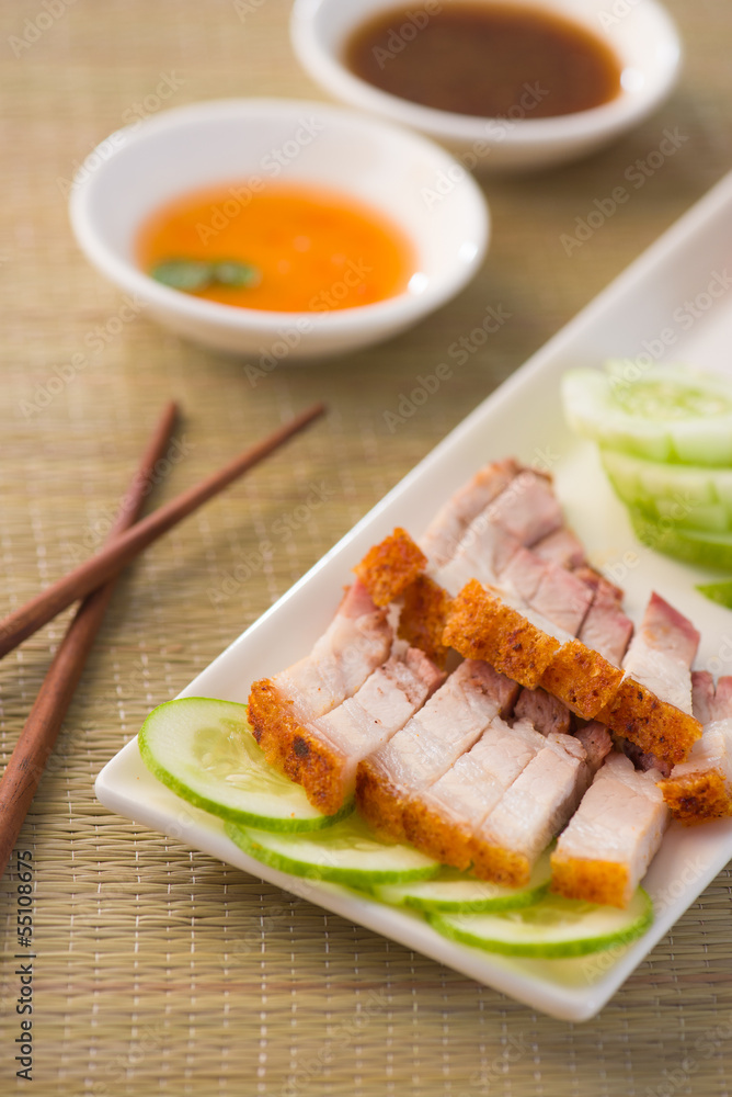 chinese roast pork close up shot served with chilli sauce chinese roast pork close up shot served with chilli sauce